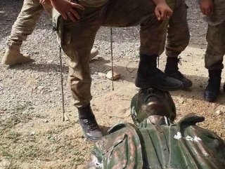 PKK'lı heykelinin üzerine basan askere soruşturma